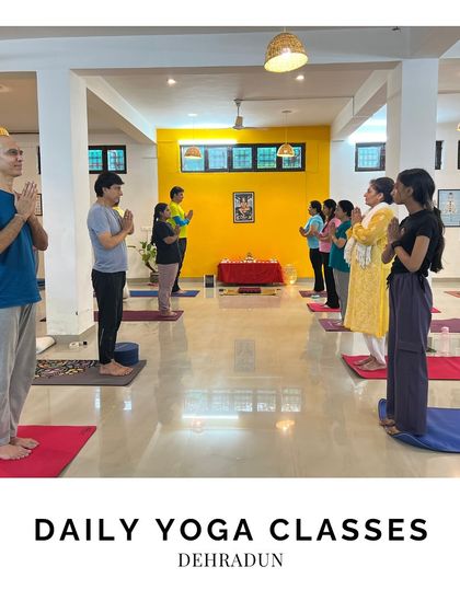 We also have a vibrant yoga center in Dehradun. Here, students gather for a daily class, starting their practice with a prayer to center their minds and set a positive intention.