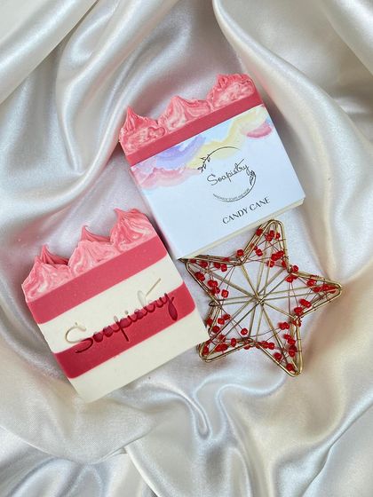 The Candy Cane soap, a sweet treat for your skin. It brings a pop of color and festive fragrance to your bath.