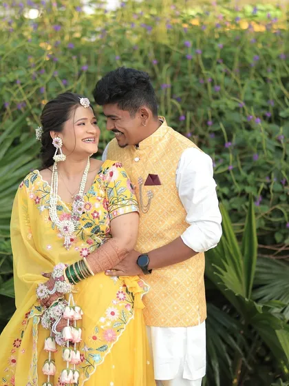 A lovely couple portrait from the Haldi event. The floral jewellery connects the bride's look from head to toe.