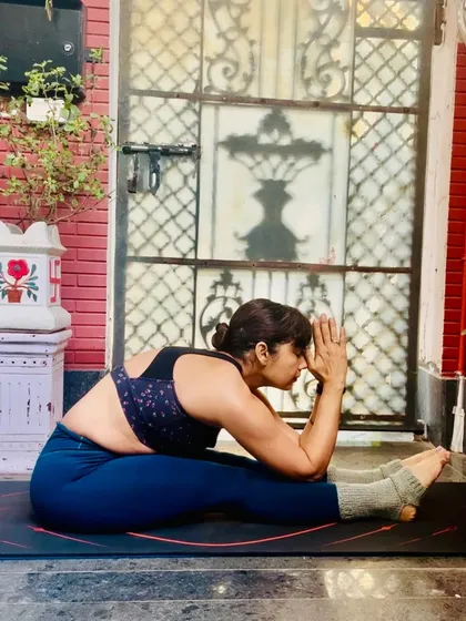 Paschimottanasana, or Seated Forward Bend, is a posture of surrender and gratitude. It's a reminder to honor every moment, as every challenge is a sacred nudge to grow.