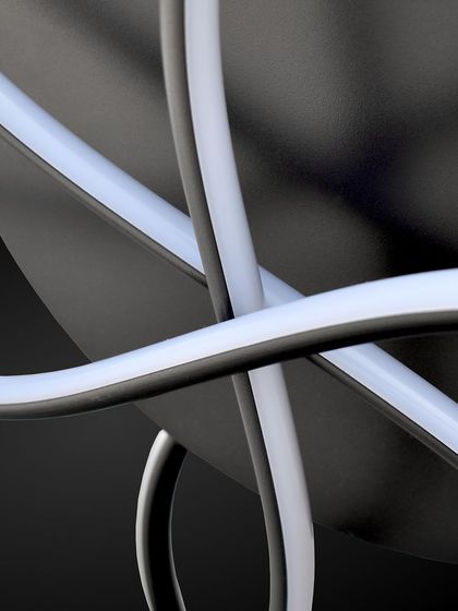 A close-up of the interlocking rings of the floret chandelier.