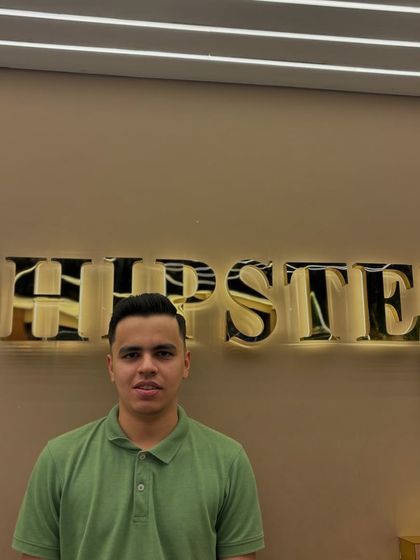 A happy client after his fresh haircut, looking sharp and ready for a fresh start.