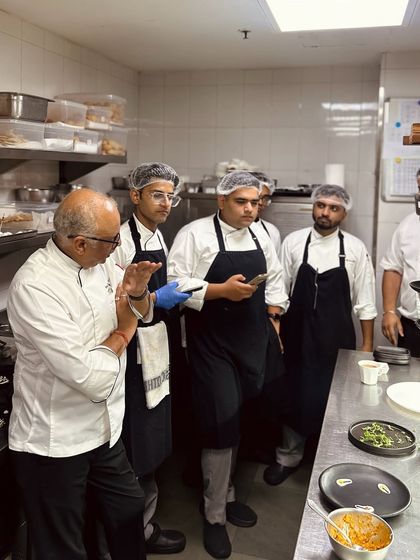 Chef Shantanu Mehrotra briefs the kitchen team, ensuring every member understands the vision and execution for the service ahead. Teamwork is the key to our consistency.