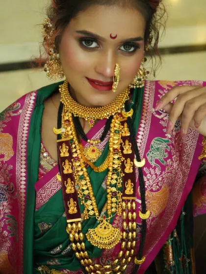 A full view of the stunning Maharashtrian bridal attire and makeup. My students learn about the cultural significance of each element to create a truly authentic and respectful look.