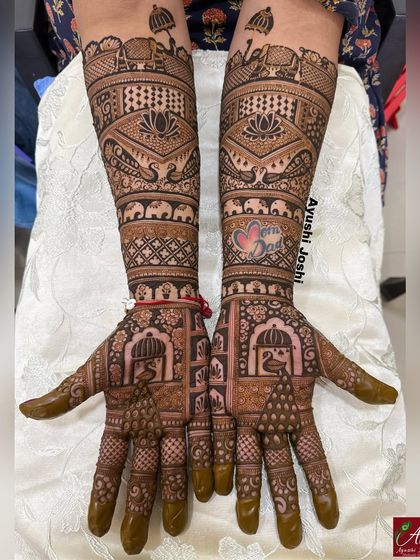 A royal design, perfect for a bridesmaid, adorned with peacocks, elephants, and blooming lotuses for a look that is festive and grand.