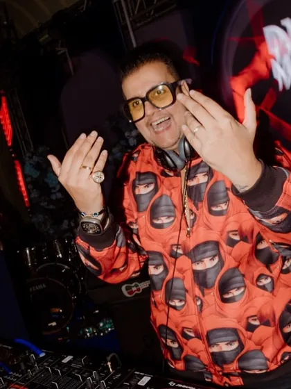 A candid moment of me interacting with the crowd. I love to connect with the audience and make them feel the joy of the celebration.