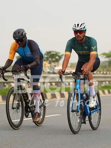 Two masters riders, working together in a breakaway.
