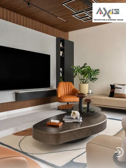 I believe a living room should be a seamless blend of style and comfort. This space features a modern media wall with integrated storage, a comfortable sectional sofa, and a mix of textures that create a warm, inviting atmosphere for relaxation and entertainment.