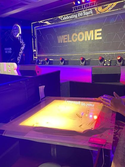 My sister and I doing a final check of the storyboard before the Kohler show. Teamwork is essential for a flawless performance.