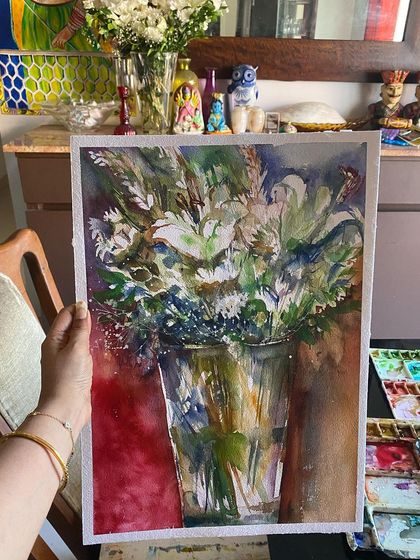When there are fresh flowers at home, I have to paint them. This watercolor still life captures a bouquet in a glass vase, an exploration of light, reflection, and floral forms.