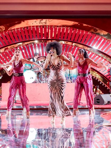 The stage at 'Le Rouge' in Doha, where the performers entertained guests. The layered red backdrop and glamorous lighting were designed to match the high-energy, burlesque theme.