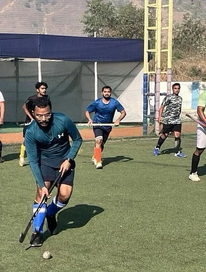 A player dribbles up the field, showcasing the dynamic movement we practice in our sessions.