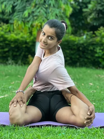 A simple seated twist can bring great balance to the body and mind. This young student shows how it's done.
