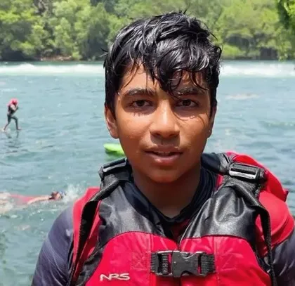 A portrait of a young participant, happy and confident after a session on the water at our Dandeli summer camp.