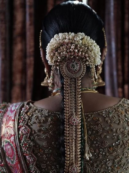 A collection of detailed shots focusing on the diverse and intricate embroidery of my custom blouses. These images highlight the fine craftsmanship, luxurious materials, and unique designs that define my work.