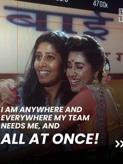 I am anywhere and everywhere my team needs me, all at once. This photo captures a moment of connection with one of my dancers on set, a reminder that my job is not just to direct, but also to support and guide.