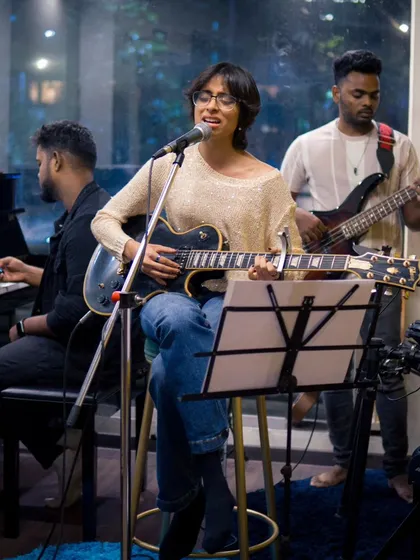 From intimate jams to full band recordings, our studio is equipped for it all. This artist session captures the vibe of a live performance, showcasing a singer guitarist backed by keys and bass in a professional setup.
