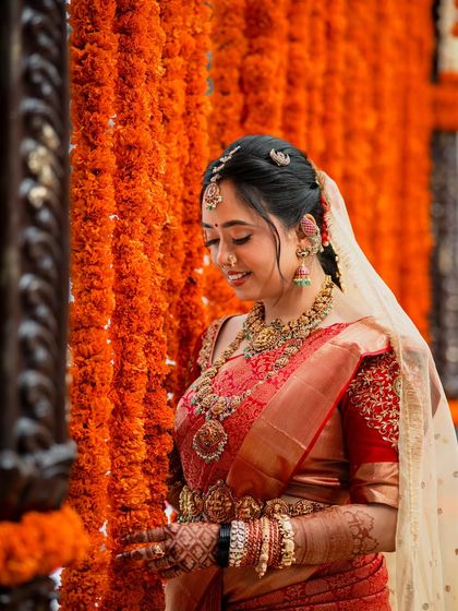 A serene portrait of the bride, her makeup looking soft and elegant.