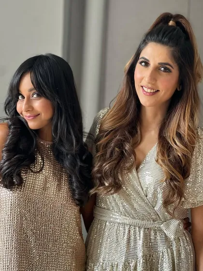 Another shot with the lovely Chef Chinu Vaze, whose hair I styled in soft, open curls. Two great party hair options for friends getting ready together.