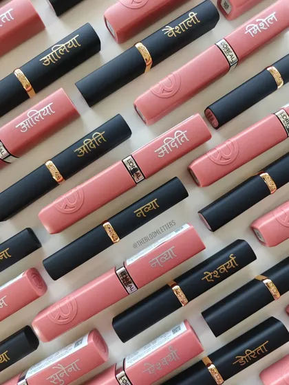 A beautiful collaboration with L'Oréal Paris, where I personalized over 500 lipsticks. Seeing names elegantly written in Devanagari script on these iconic products was a dream. This project shows how a personal touch can elevate even the most well known brands.