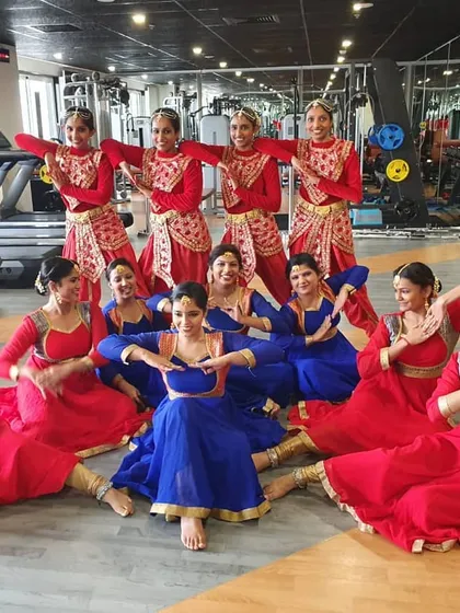 This is the team from Rockwell after a rehearsal for their corporate annual day. We created a beautiful semi-classical performance, and I can work with your team right in your office gym or any comfortable space.
