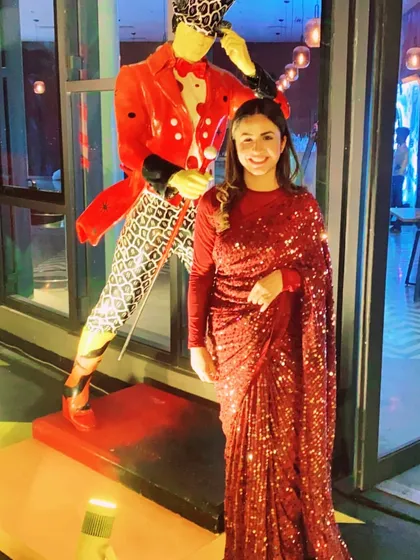 For festive occasions, you can't go wrong with a classic red sequin saree. This look is all about high-impact glamour. I focus on finding the right shade and fit to make you the star of the event.