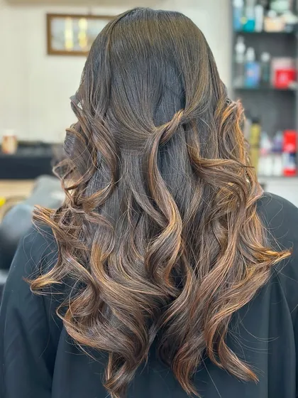 Another view of these beautiful brown curls, showing the dimension and shine.