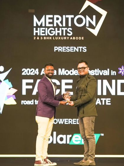 Receiving an award for my role in executing the 'Face of India' event. It's a privilege to be recognized by industry leaders for my team's contribution.