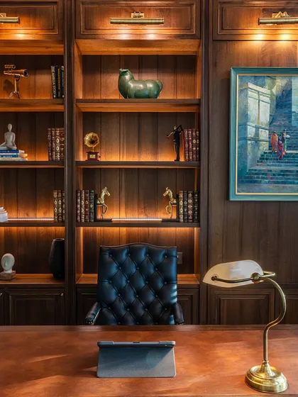 Designing an office is about creating a space that is both productive and inspiring. For this workspace at One Place Lodha, I focused on a sophisticated, warm atmosphere using rich wood tones, classic English-style decor, and carefully selected furniture. The goal was to make it feel less like a corporate office and more like a refined, comfortable study.
