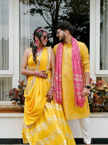 A sweet, candid moment between the couple. Her makeup looks flawless and natural even up close.