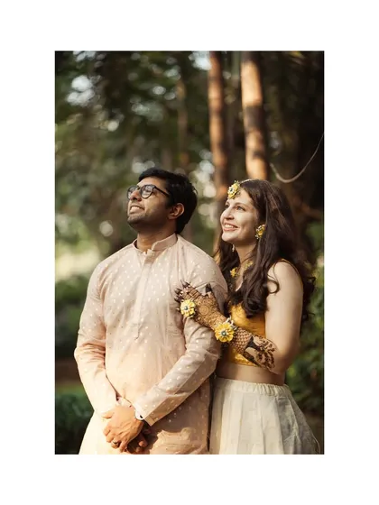 A beautiful portrait of Amanda and Ankur during their mehendi ceremony. The soft natural light and their coordinated outfits create a serene and joyful image.