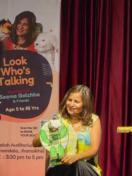 Here I am with a flat puppet, one of the many characters I bring to life. My shows for kids feature up to 10 different puppets and objects.