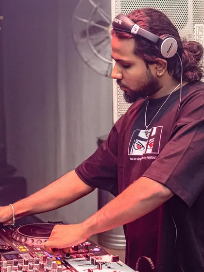 These shots capture me in my element, from different angles and at various events. Each one is a glimpse into my life as a music maker, focused on the craft and connecting with the crowd.