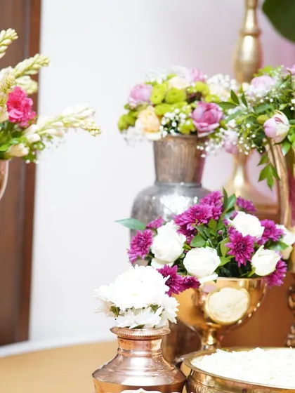 A variety of floral arrangements ready to be placed. We use a mix of local and exotic flowers to create unique combinations for each event.