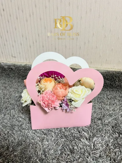 A simple and sweet heart-shaped floral box, a perfect small token of love for Mother's Day.