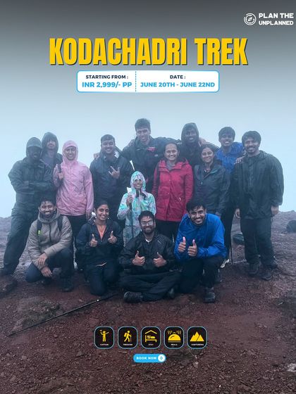 A group of trekkers on the misty summit of the Kodachadri trek.