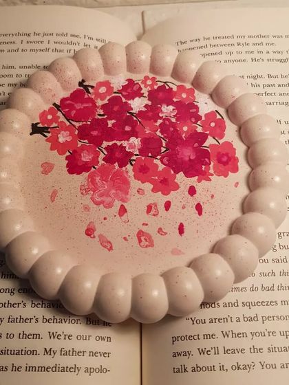 A top-down view of our sold-out hand-painted cherry blossom bubble tray.