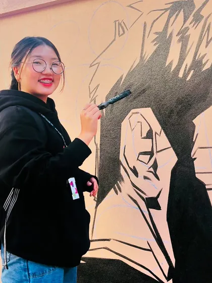 A student from St. Claret College trying her hand at painting. I love it when my projects inspire others to get creative.