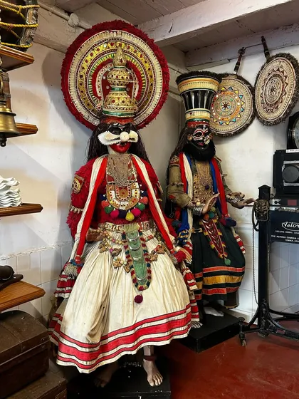 An inspiration image showing traditional Kathakali costumes and figures. This cultural heritage is a deep source of inspiration for my paintings on the subject.