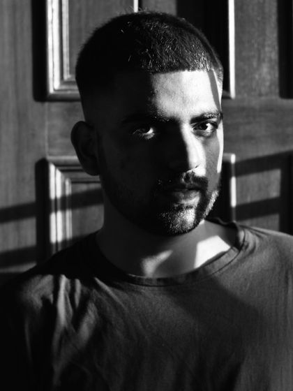 A personal black and white portrait, playing with strong light and shadow.