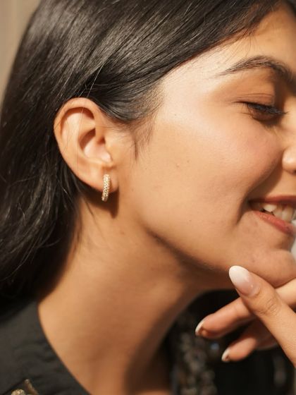 Another look at these sparkling hoop earrings. They are versatile enough to be worn with both Indian and western casual outfits.