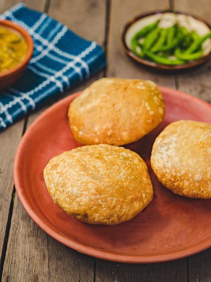A closer look at our crispy, flaky Kachoris. They are perfect on their own or paired with our tangy aloo sabzi.