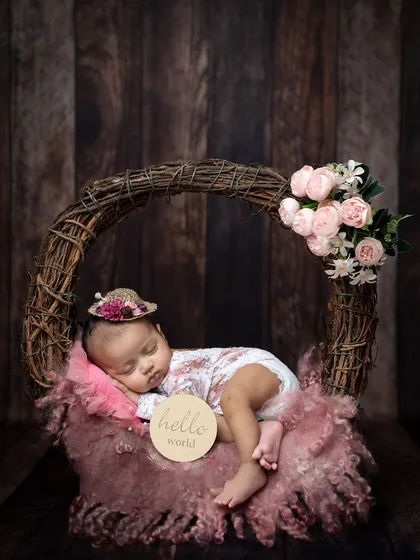 A variation of the wreath basket pose, this time with a tiny, elegant straw hat. I have a variety of accessories to customize each setup.
