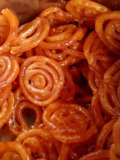 Freshly made, crispy jalebis soaked in sweet syrup. This is one of our most requested sweets for festivals and special occasions, guaranteed to be a crowd-pleaser.