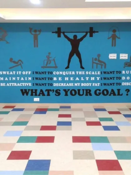 Your floor can be a source of energy and motivation. For this gym space, I installed a vibrant and durable multi-color PVC floor that can handle high foot traffic while matching the room's energetic theme. This shows that flooring can be both functional and fun.