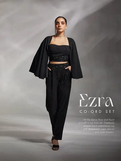 Hit the dance floor in our Ezra set, offering a timelessly elegant hand-embellished top and sleek trousers.