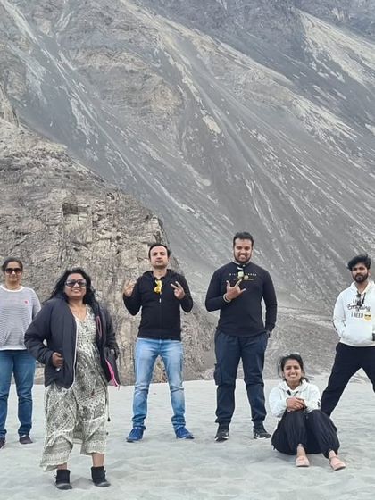 The group enjoying the stark, beautiful landscapes of Ladakh. My trips are designed for you to experience the raw nature of the region with your friends.