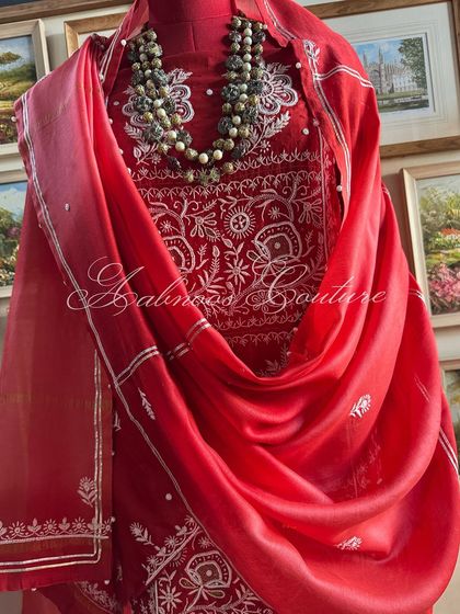 A mannequin shot showing how the ombré dupatta can be styled for a dramatic effect.