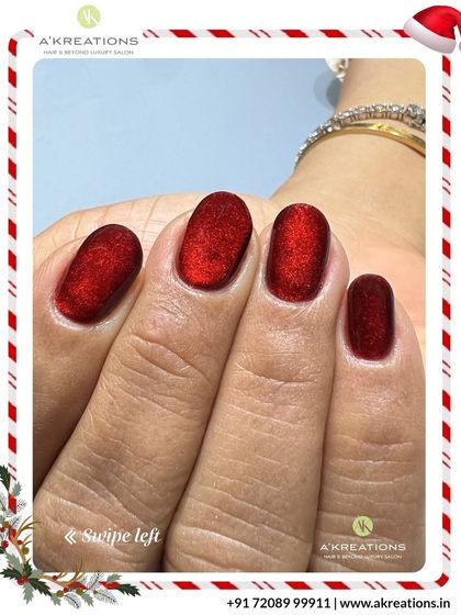 A luxurious velvet-effect Christmas manicure in a deep, sparkling red, perfect for holiday parties and festive gatherings.