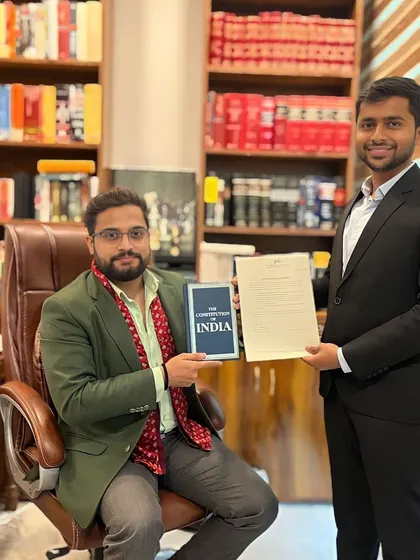 I believe in nurturing future legal talent. Here, I am with one of our January interns, presenting him with a copy of the Constitution of India and a certificate for his dedicated work.